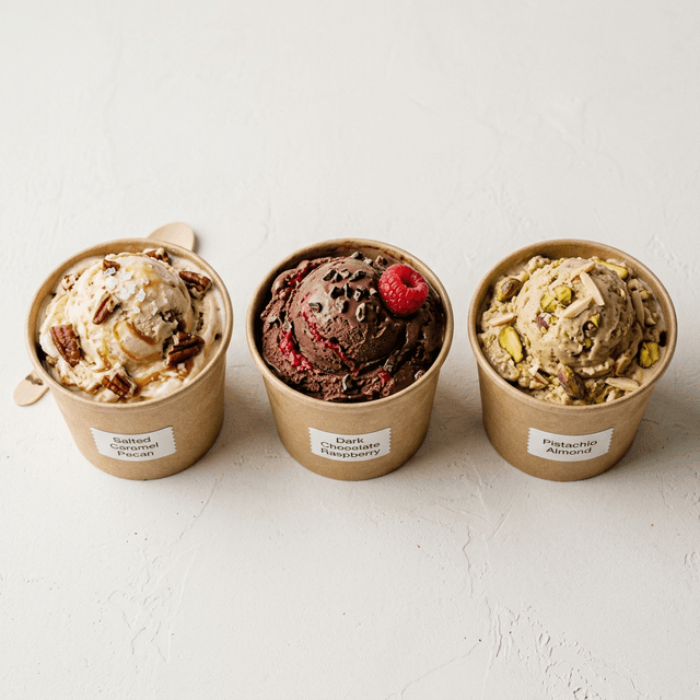 Artisanal ice cream scoops in craft paper cups